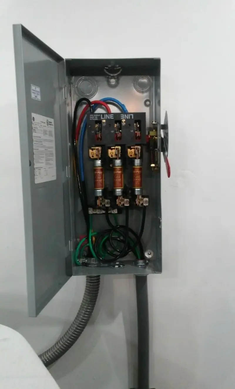 Three-phase disconnect switch installed for Smoke Detector Installation in New Burlington