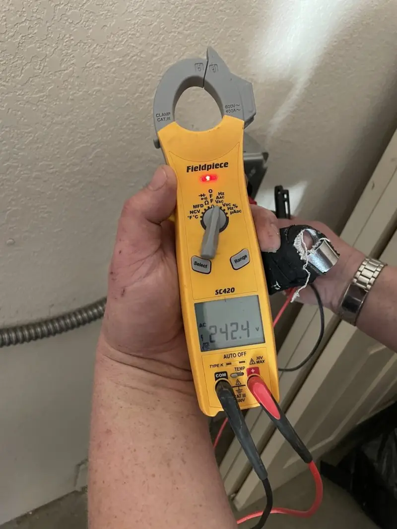 Voltage testing with clamp meter during Aluminum Wiring Replacement in New Burlington
